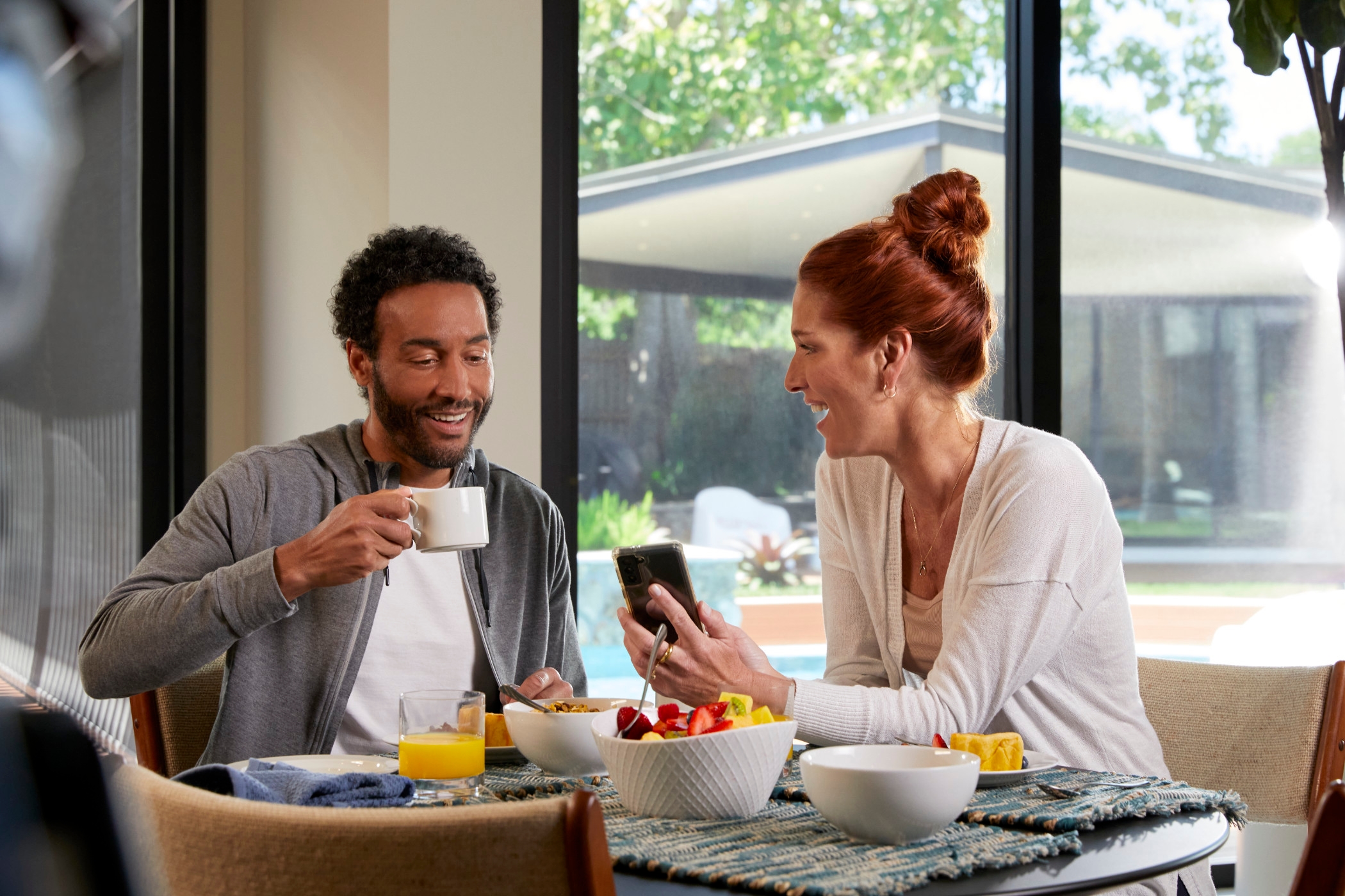 Young, attractive couple look at a cellphone.
DAM # aae26212